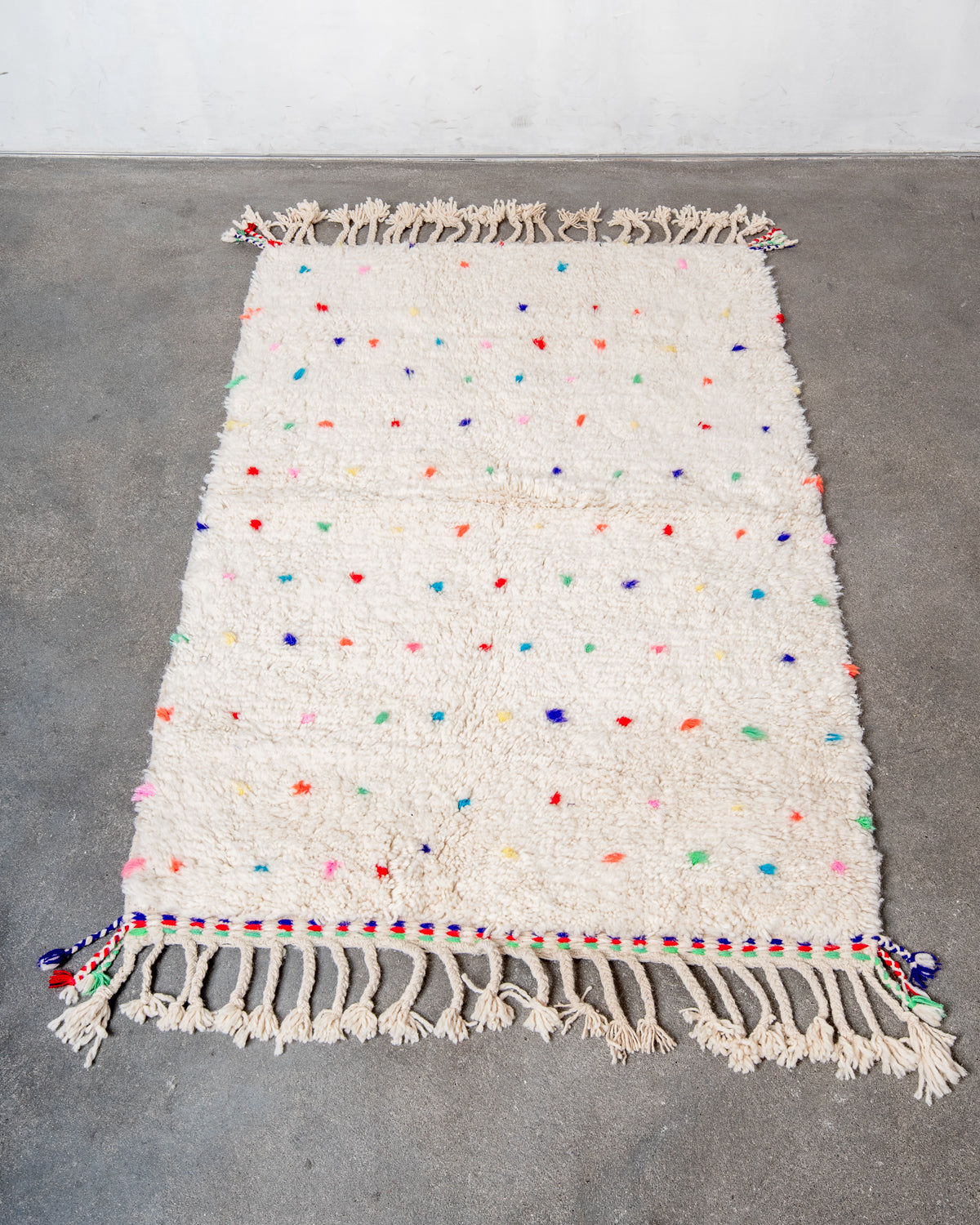 Modern, designer, handcrafted Berber rug from Morocco. Beniourain carpet with beautiful colours and patterns and fluffy wool texture.